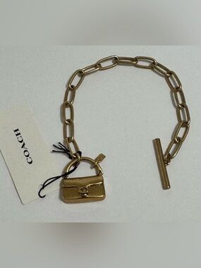 Coach Gold-Tone Link Bracelet with Tabby Purse Charm